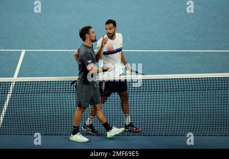 Italy s Salvatore Caruso right and compatriot Fabio Fognini