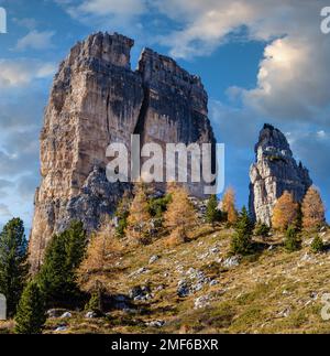 Sunny autumn alpine Dolomites rocky  mountain scene, Sudtirol, Italy. Cinque Torri (Five pillars or towers) rock famous formation. Picturesque traveli Stock Photo