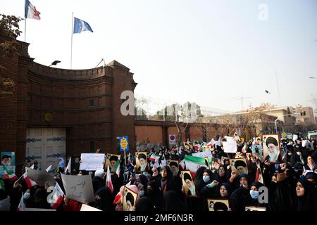 Tehran, Tehran, Iran. 24th Jan, 2023. Iranian demonstrator students gather in front of the French Embassy in Tehran to protest against cartoons published by the French satirical magazine Charlie Hebdo that lampoon Iran's ruling clerics, Iran (Credit Image: © Sobhan Farajvan/Pacific Press via ZUMA Press Wire) EDITORIAL USAGE ONLY! Not for Commercial USAGE! Stock Photo