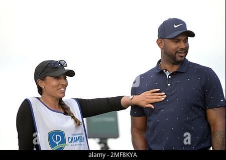 Professional baseball player Aaron Hicks, right, and his caddie Cheyenne  Woods, niece of golfer Tiger Woods