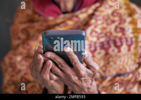 senior women hand using smart phone close up  Stock Photo