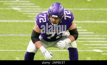 Minnesota Vikings offensive tackle Ezra Cleveland (72), right, and  offensive tackle Brian O'Neill (75) in action in the first quarter during  an NFL football game against the Atlanta Falcons, Sunday, Oct. 18