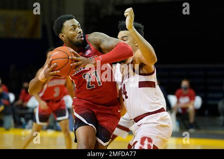 Arizona forward Jordan Brown 21 is defended by Stanford forward