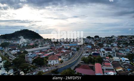 Aerial view of Sunrise scenery from the Siti Nurbaya Bridge, Jembatan Siti Nurbaya Padang, West Sumatera. Padang, Indonesia, January 25, 2023 Stock Photo