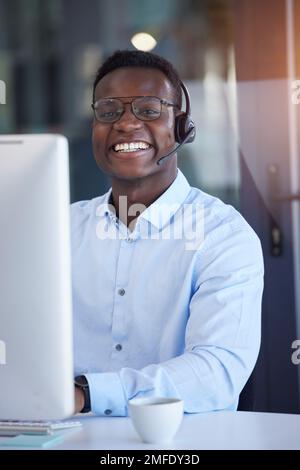 Black man, call center and portrait by computer with smile, typing and customer service in office. Crm expert, telemarketing and consulting for tech Stock Photo