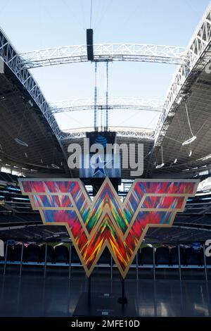 A sculpture in the shape of the 'Wonder Woman' logo sits on the main  concourse of AT&T Stadium before an NFL football game between the San  Francisco 49ers and Dallas Cowboys in