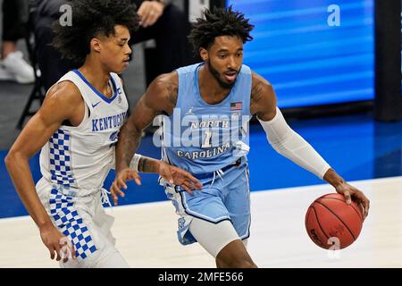 North Carolina's Leaky Black (1) drives around UCLA's Jaime Jaquez Jr ...