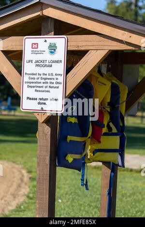 A life jacket loaner program is available for use at Mosquito Lake State Park’s beach in Cortland, Ohio. Part of Mosquito Creek Lake is leased to the Ohio Department of Natural Resources, which operates Mosquito Lake State Park. The U.S. Army Corps of Engineers Pittsburgh District operates the reservoir to provide flood protection for the Mahoning River Valley as well as for the Beaver and upper Ohio rivers. Mosquito Creek Lake also stores water and releases it downstream during dry periods to improve water quality and quantity for domestic and industrial use, recreation, aesthetics and aquati Stock Photo