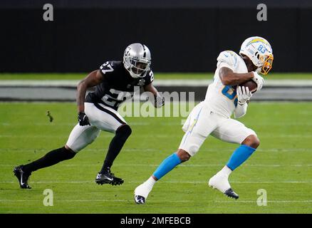 Los Angeles Chargers wide receiver Tyron Johnson (83) is defended