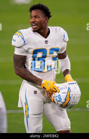 Los Angeles Chargers wide receiver Tyron Johnson (83) is defended