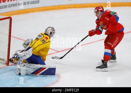 Goalie of Sweden Magnus Hellberg (left) and Yegor Sharangovich (right) of  Belarus in action during the Ice Hockey World Championships match Sweden  vs. Belarus in Copenhagen, Denmark., May 4, 2018. (CTK Photo/Ondrej