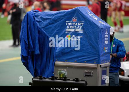 A Microsoft Surface logo is visible before an NFL football game