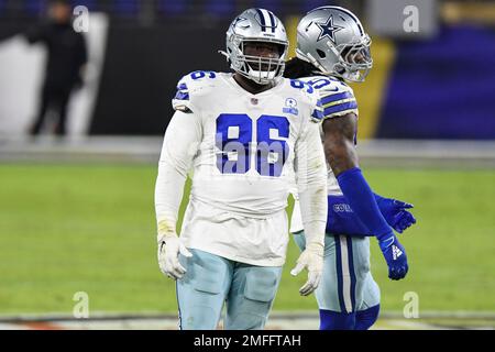 Cincinnati, OH, USA. 13th Dec, 2020. Dallas Cowboys defensive tackle  Neville Gallimore #96 breaks through between Cincinnati Bengals offensive  guard Quinton Spain #67 and Cincinnati Bengals offensive tackle Bobby Hart  #68 during