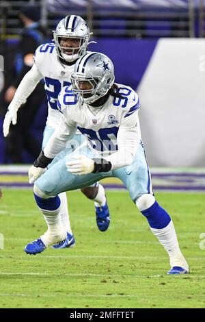 Dallas Cowboys linebacker DeMarcus Ware (94) and defensive end Jason  Hatcher (97) celebrate Ware's second sack of the first half against the New  York Giants in the NFL season opener at MetLife