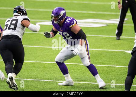 MINNEAPOLIS, MN - NOVEMBER 24: Minnesota Vikings offensive linemen Ezra  Cleveland (72) is introduced