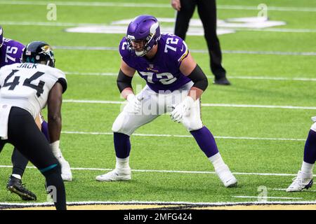 MINNEAPOLIS, MN - NOVEMBER 24: Minnesota Vikings offensive linemen Ezra  Cleveland (72) is introduced