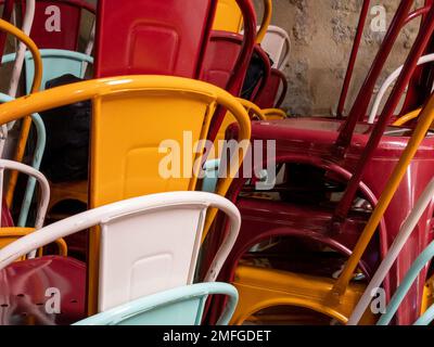 stack of chairs of Industrial Metal Chair in bar restaurant Stock Photo