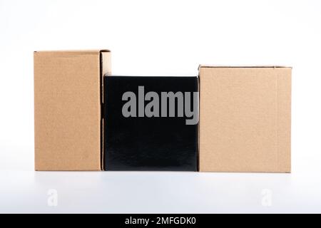 cargo box brown and black boxes on white background Stock Photo