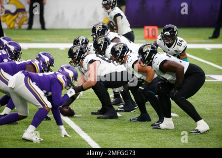 Players get set on the line of scrimmage during the second half of an NFL  football game between the Houston Texans and the Chicago Bears, Sunday,  Sept. 25, 2022, in Chicago. The