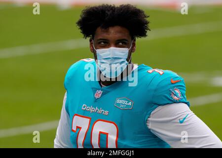 Miami Gardens, Florida, USA. 1st Dec, 2019. Miami Dolphins offensive tackle  Julie'n Davenport (70) is attended on the field by team's staff during an  NFL football game against the Philadelphia Eagles at