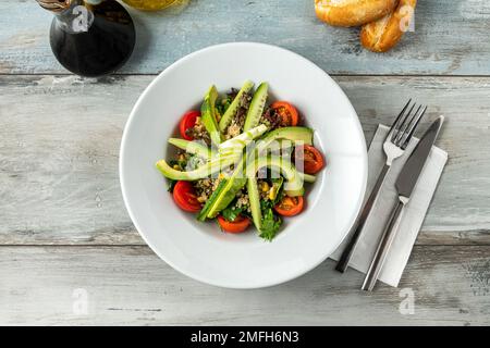 Quinoa and avocado salad. Detox diet or just a healthy meal concept Stock Photo