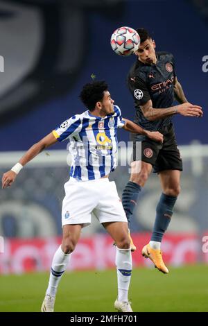 Manchester City's Joao Cancelo heads the ball during the Champions