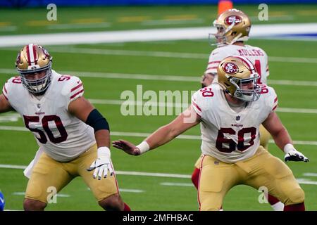 Chicago Bears head coach John Fox celebrates a field goal with Chicago Bears  center Hroniss Grasu (55) during the first half of an NFL football game  against the San Francisco 49ers, Sunday