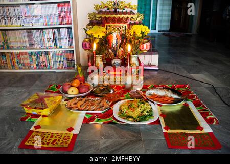 Sacrificial offering for chinese tutelary deity folk religion of taoism Tudigong or Tudishen god lord of soil and ground in shrine in new year at hous Stock Photo