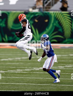 Wide receiver Isaac Curtis of the Cincinnati Bengals is tackled by