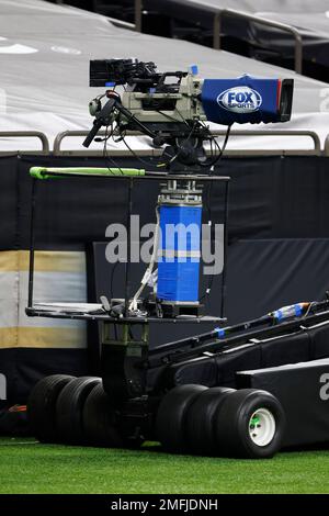 A FOX Sports television camera operator works from a mobile