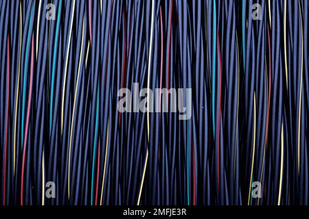 a reel of multi-colored cable for power lines Stock Photo