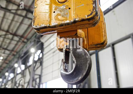 hook from a lifting crane for three tons, on a white background Stock Photo