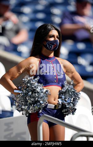 A Houston Texans cheerleader performs wearing a salute to service uniform  during an NFL football game against the New England Patriots, Sunday, Nov.  22, 2020, in Houston. (AP Photo/Matt Patterson Stock Photo 