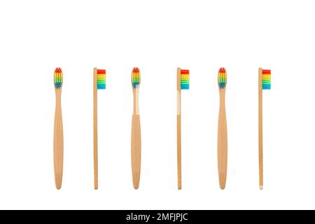 Bamboo toothbrushes with color bristles isolated on a white background with copy space Stock Photo