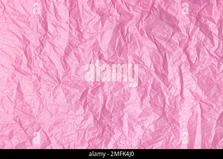 Background from delicate pink crumpled paper.  Lots of empty space Stock Photo