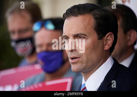 Former Nevada Attorney General Adam Laxalt, co-chair of the Donald Trump Nevada campaign, speaks at a news conference Tuesday, Nov. 17, 2020, in Las Vegas. (AP Photo/John Locher)