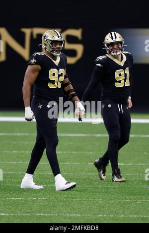 New Orleans, USA. 27th Aug, 2023. Houston Texans quarterback C.J. Stroud  (7) attempts a pass while facing a heavy pass rush from New Orleans Saints  defensive ends Tanoh Kpassagnon (92) and Carl