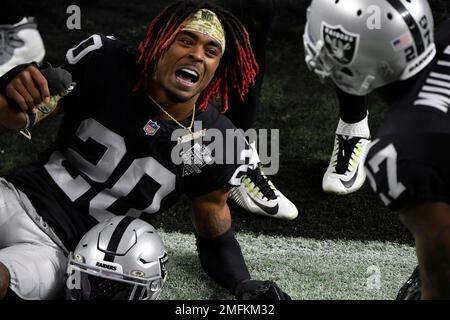 Las Vegas Raiders cornerback Damon Arnette #20 celebrates after a fumble  recovery by cornerback Nevin Lawson #26 during the second half against the Denver  Broncos during an NFL football game, Sunday, Nov.