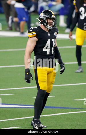 Baltimore, United States. 01st Jan, 2023. Baltimore Ravens tight end Isaiah  Likely (80) is brought down by Pittsburgh Steelers linebacker Robert  Spillane (41) during the first half at M&T Bank Stadium in