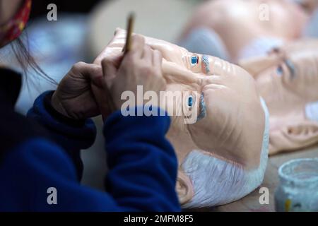 Workers of Ogawa Studios Co. are making rubber face masks of