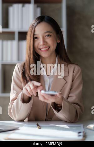 A businesswoman completes KYC using an online banking program in order to open a digital savings account. The definition of cyber security Stock Photo