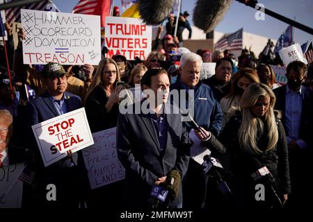 Former Nevada Attorney General Adam Laxalt speaks during a news conference outside of the Clark County Election Department, Sunday, Nov. 8, 2020, in North Las Vegas. (AP Photo/John Locher)
