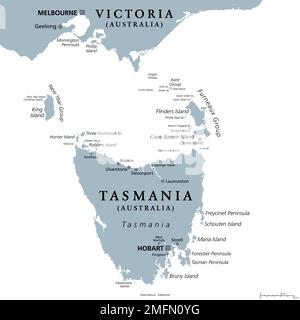 Tasmania and the surrounding area, gray political map. Australian island state with capital Hobart, south of Victoria and the Australian mainland. Stock Photo
