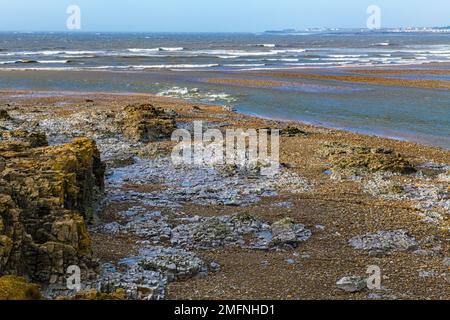 The beach at Ogmore by Sea on the South Wales Coast on a bright winter day in January Stock Photo