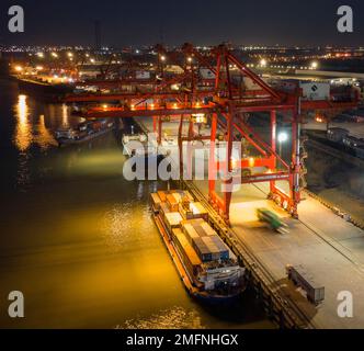 NANJING, CHINA - JANUARY 25, 2023 - Photo taken by drone on Jan 25, 2023 shows a ship loading and unloading containers at Longtan Port of Nanjing Port Stock Photo