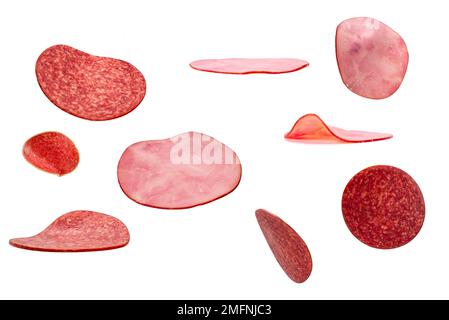 Falling tasty salami isolated on white background. Stock Photo