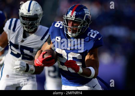 New York Giants' Saquon Barkley runs on the field before an NFL football  game against the Washington Commanders, Sunday, Dec. 4, 2022, in East  Rutherford, N.J. (AP Photo/John Minchillo Stock Photo - Alamy