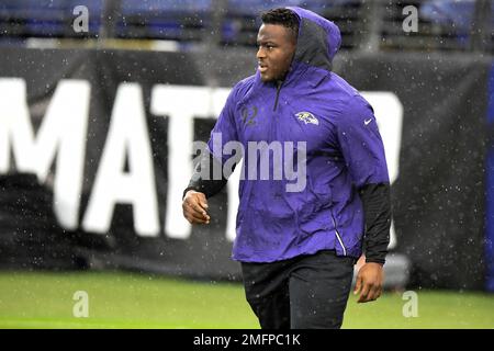 Baltimore Ravens defensive tackle Justin Madubuike (92) gets to