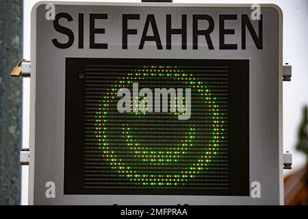 Ladebow, Germany. 25th Jan, 2023. A digital display reading 'You drive' on a street in Ladebow (part of Greifswald) shows a green smiley face to a passing car in a 30-mph zone as a commendation for the driver's correct speed. Credit: Stefan Sauer/dpa/Alamy Live News Stock Photo
