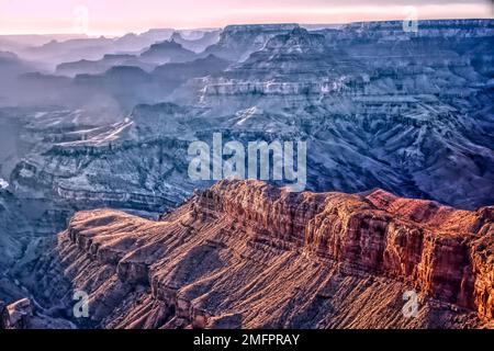An aerial view of the Grand Canyon showing layers of rock formations Stock Photo